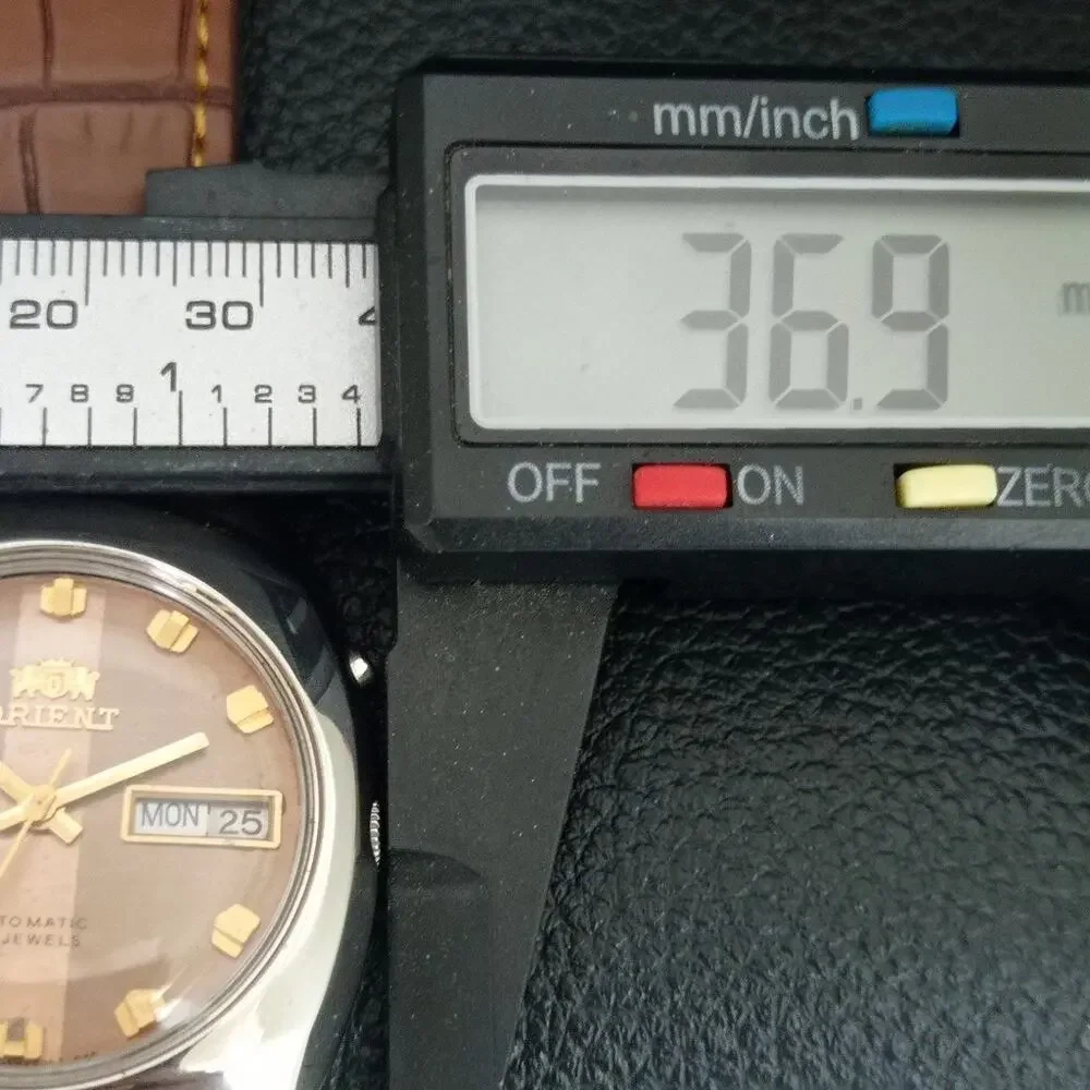 Vintage 1982 Orient Automatic Mens Silver Watch W/daydate & Gold accents